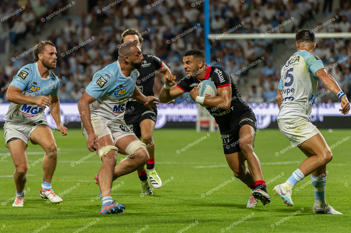 Matthis LEBEL (15) Stade Toulousain with ball - Uzair CASSIEM (8) Aviron Bayonnais Rugby Pro